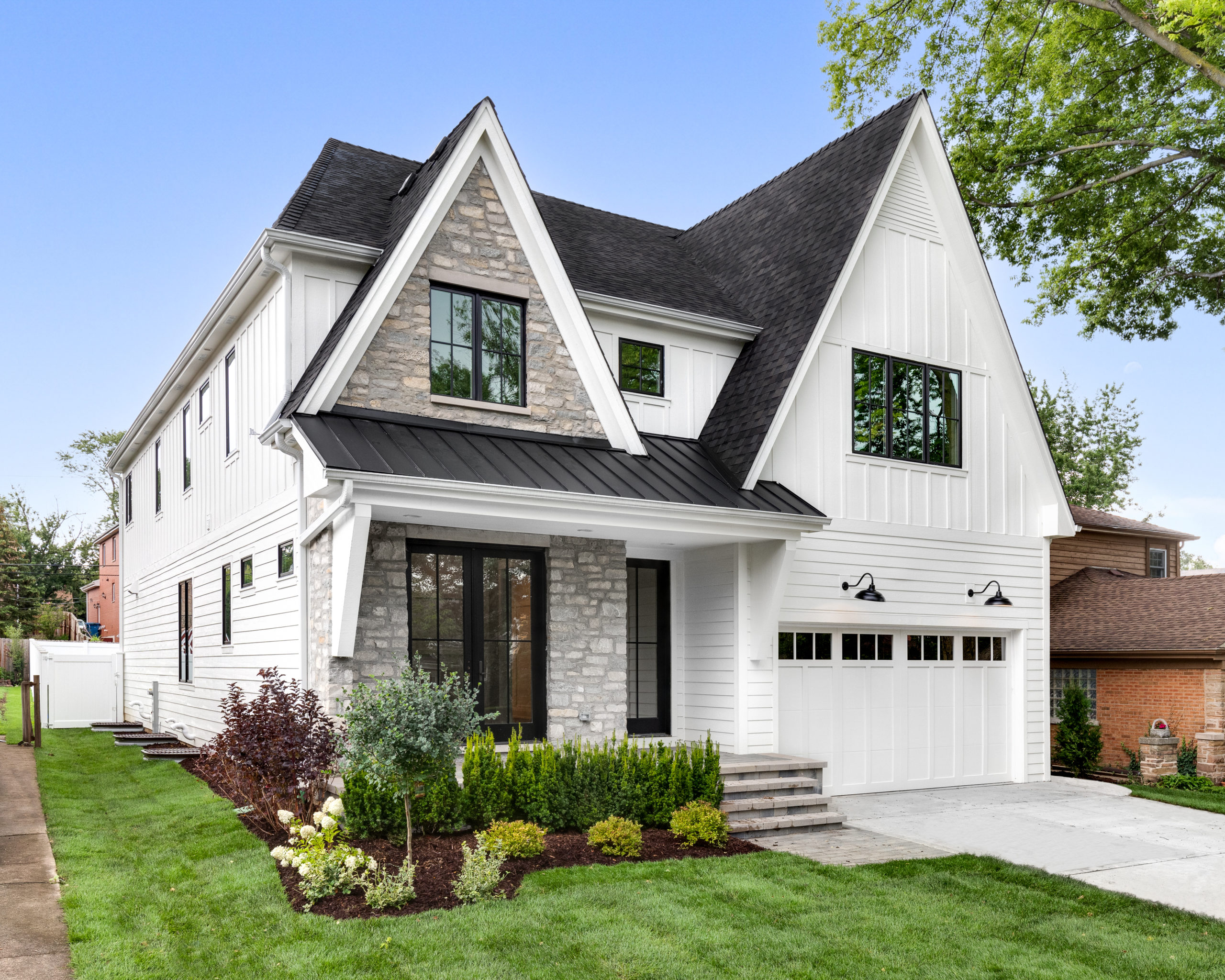 grey siding house with black trim